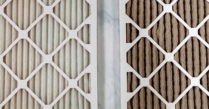 A clean and dirty air filter side by side show why you need to regularly change the air filter.