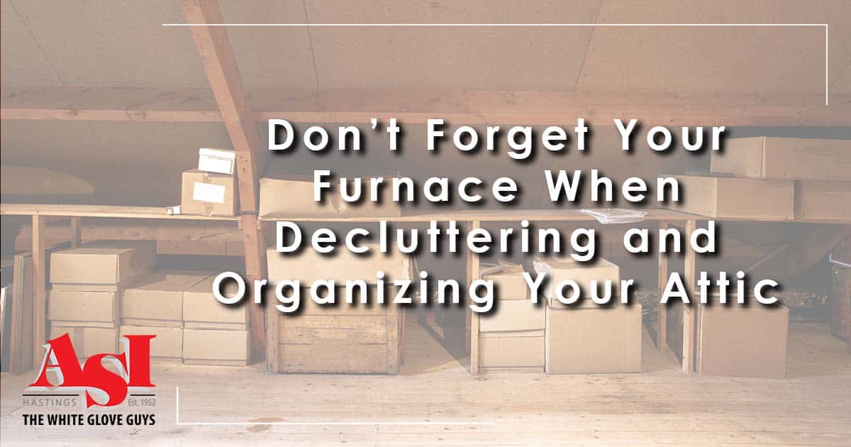 Image: shelves and boxes in the attic, cover image for Don’t Forget to Check Your Furnace When Decluttering and Organizing Your Attic.