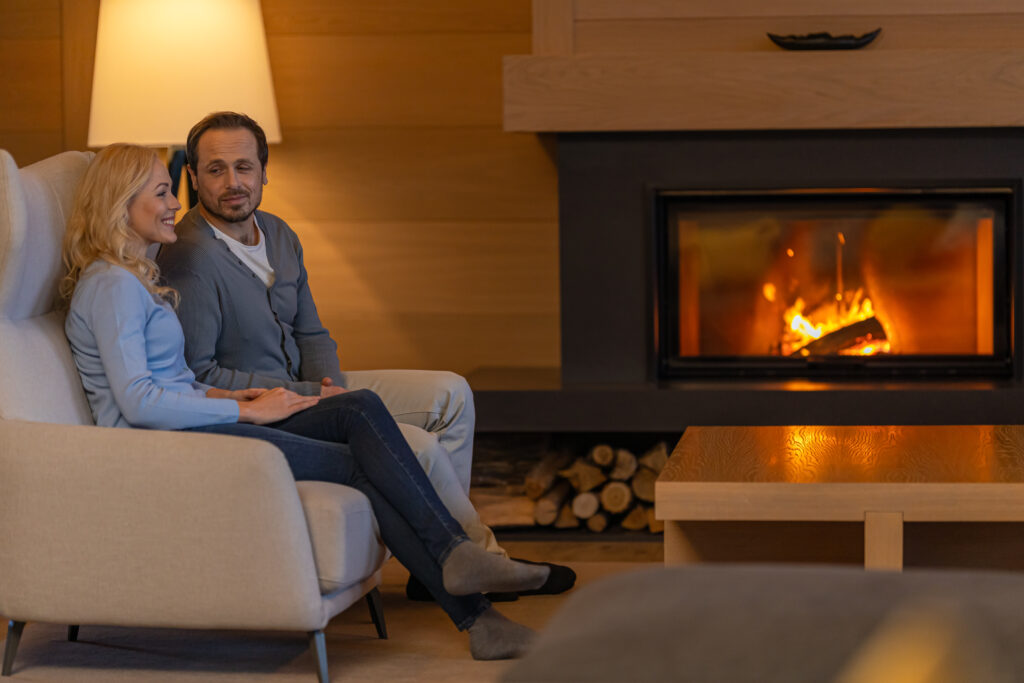 fire place safety couple by a fire