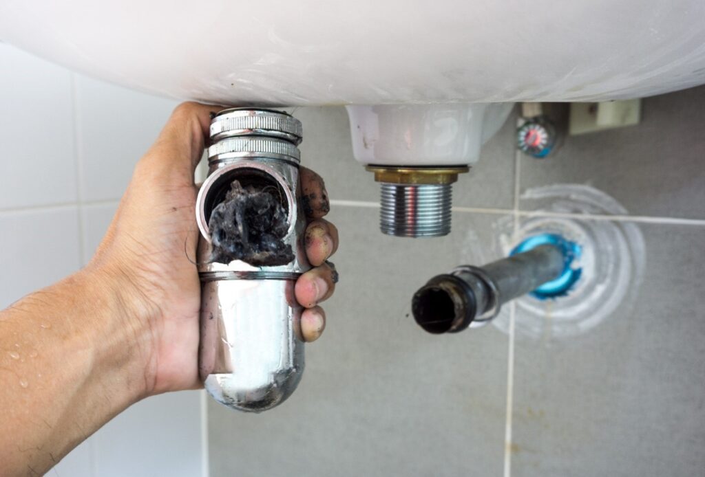 Clogged plumbing pipes reduce water pressure